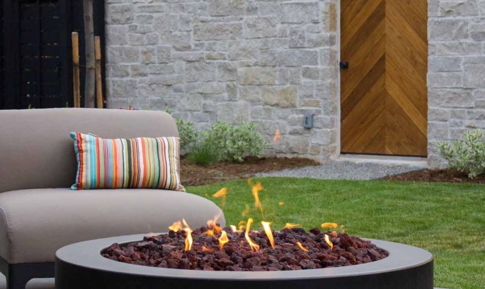 lit concrete fire pit