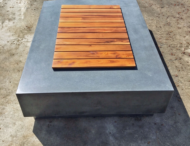 Concrete fire pit with teak cover