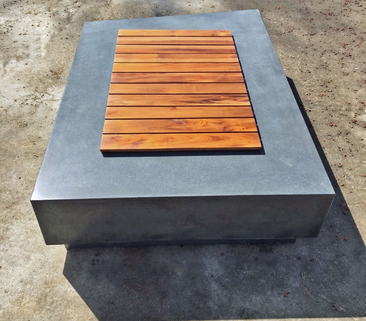 Concrete fire pit with teak cover