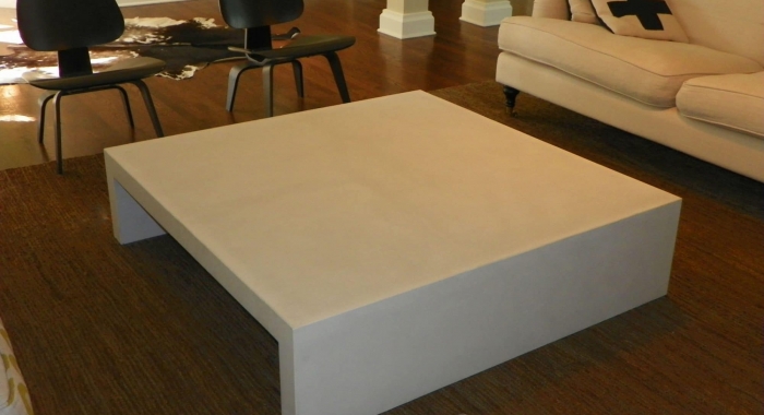 white concrete coffee table