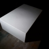 white table in shadow